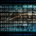 Streams of binary code flowing into a grid of glowing digital images, representing the evolution of AI